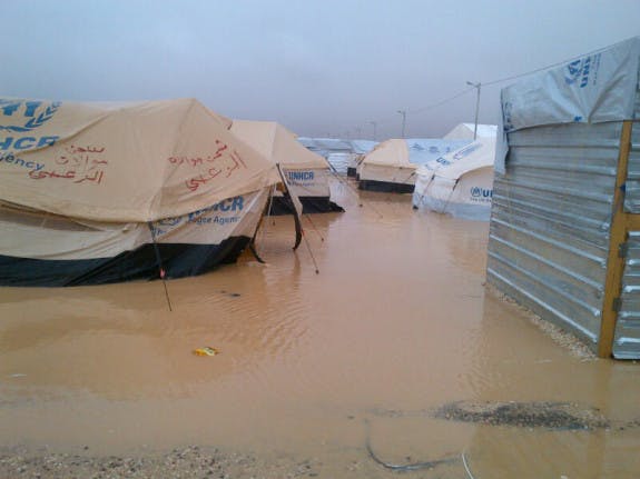 Flooding-Zaatari-2_09.01.13-575x431.jpg
